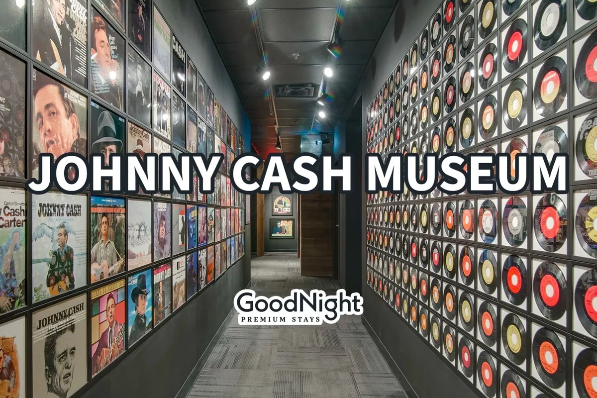 A stylish room lined with a wall of album covers and vinyl records, inviting visitors to engage with musical memorabilia. The vibrant display evokes Nashville's deep-rooted connection to music history and offers a visually dynamic nod to the city's cultural icons.