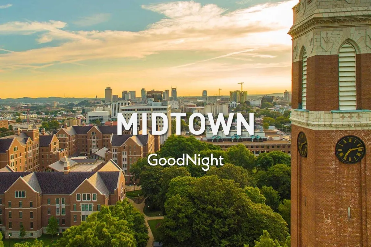 An inviting cityscape view featuring the Nashville skyline, historic buildings, green spaces, and a prominent clock tower. Evening light bathes the scene, hinting at community gatherings, leisurely strolls, and moments of reflection in a lively urban setting.